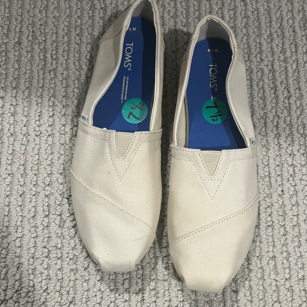 TOMS Off-White Canvas Slip-Ons